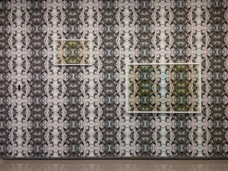 printed wallpaper with artwork by artist Kent Morris positioned on top