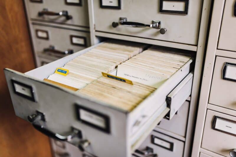 File Cabinet filing cabinet pulled out with files stacked inside