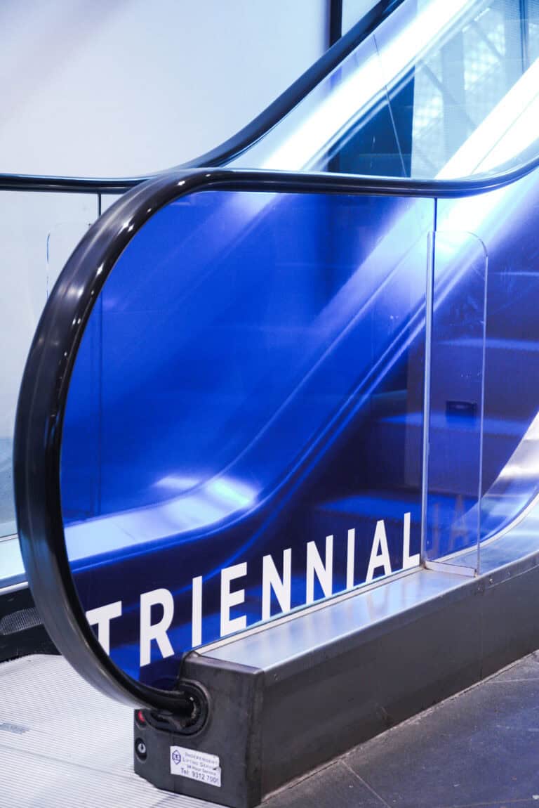 Blue Transparent film applied to glass with title printed across the bottom