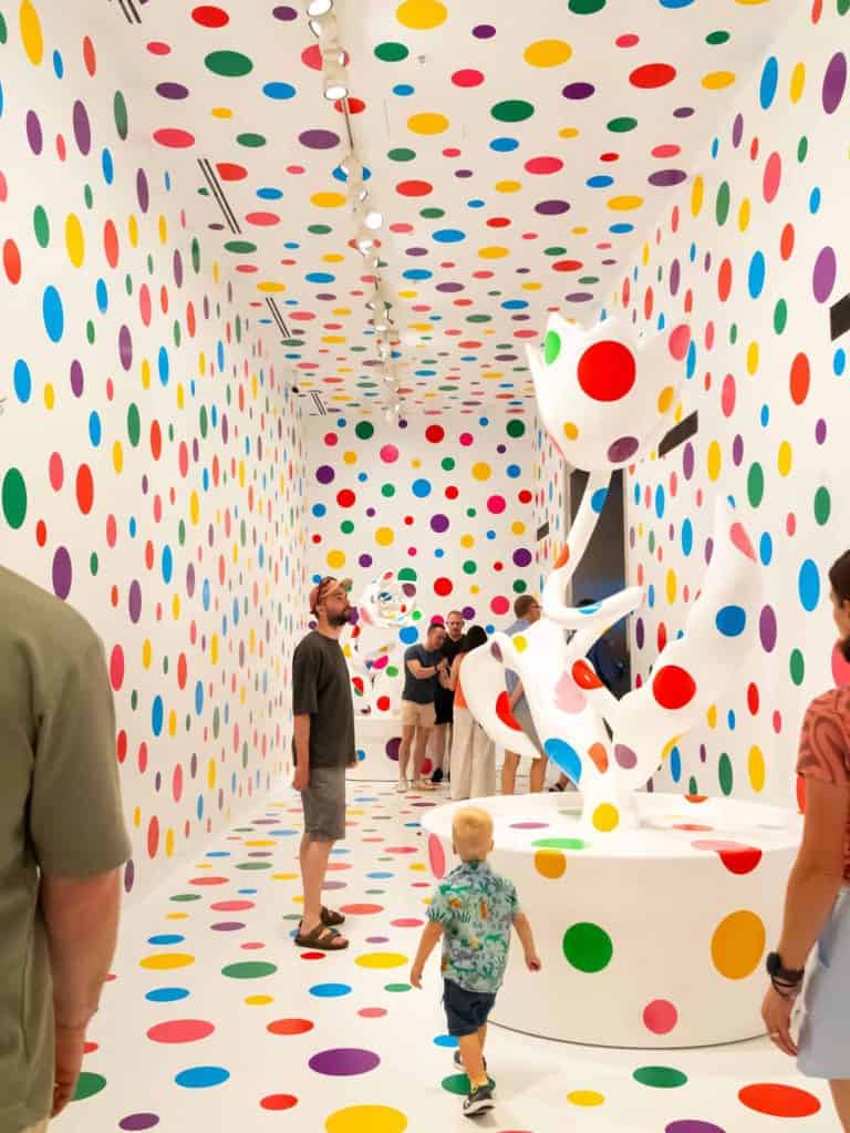 Exhibition Graphics, Titles and wallpapers for yayoi kusama's art show at NGV