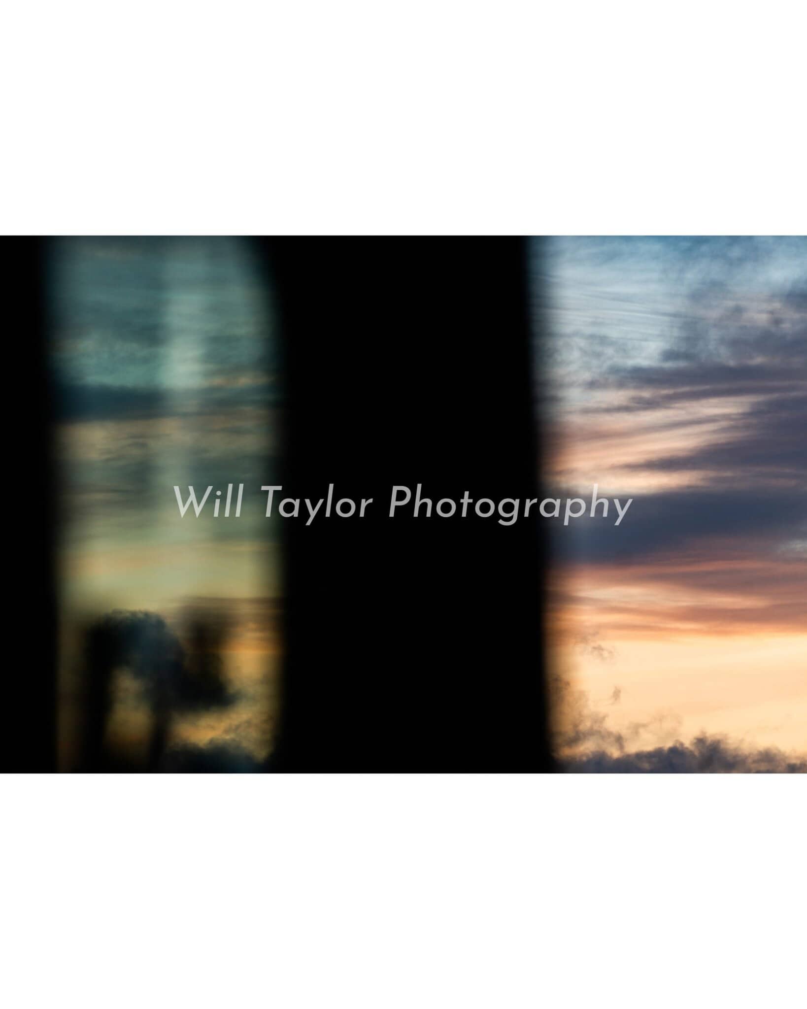 Wombh; a soft sunset broken up by the window of a car door