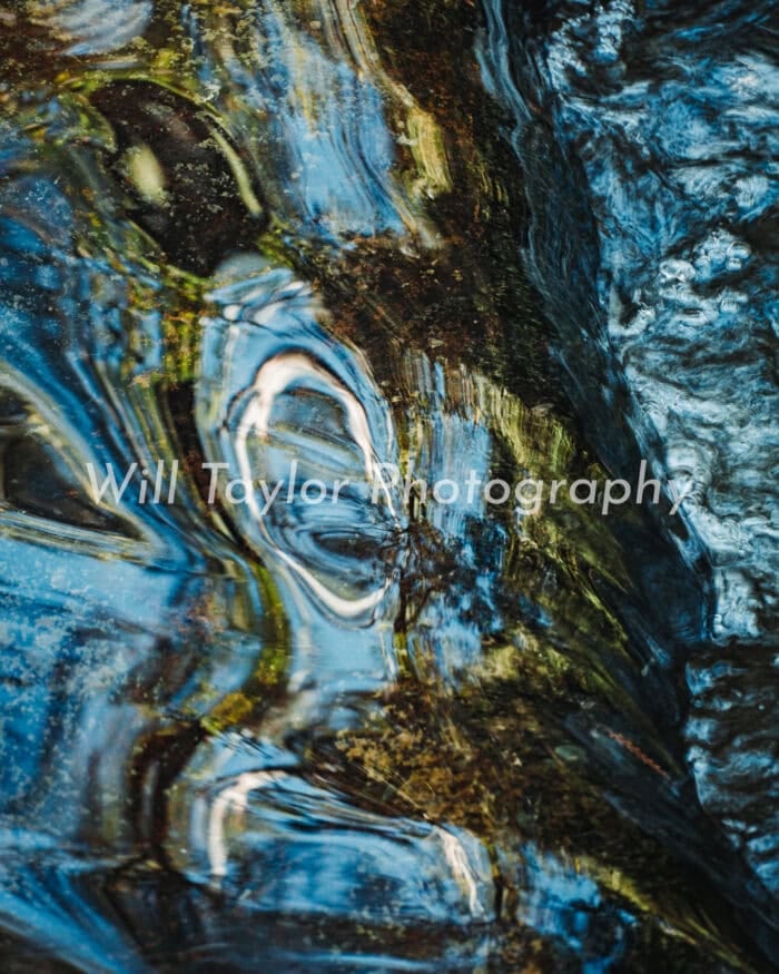 Lahse; Photograph of a flowing river captured to look like glass